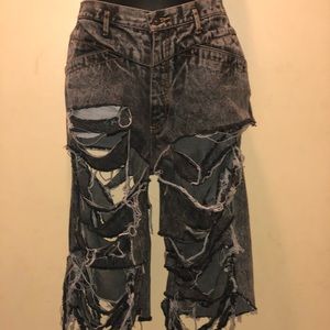 Distressed hand made denim jeans.